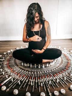Image of pregnant women with needles from IVF
